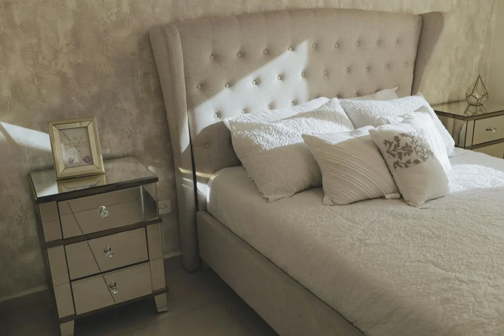 Modern bed frame in a well-designed bedroom interior