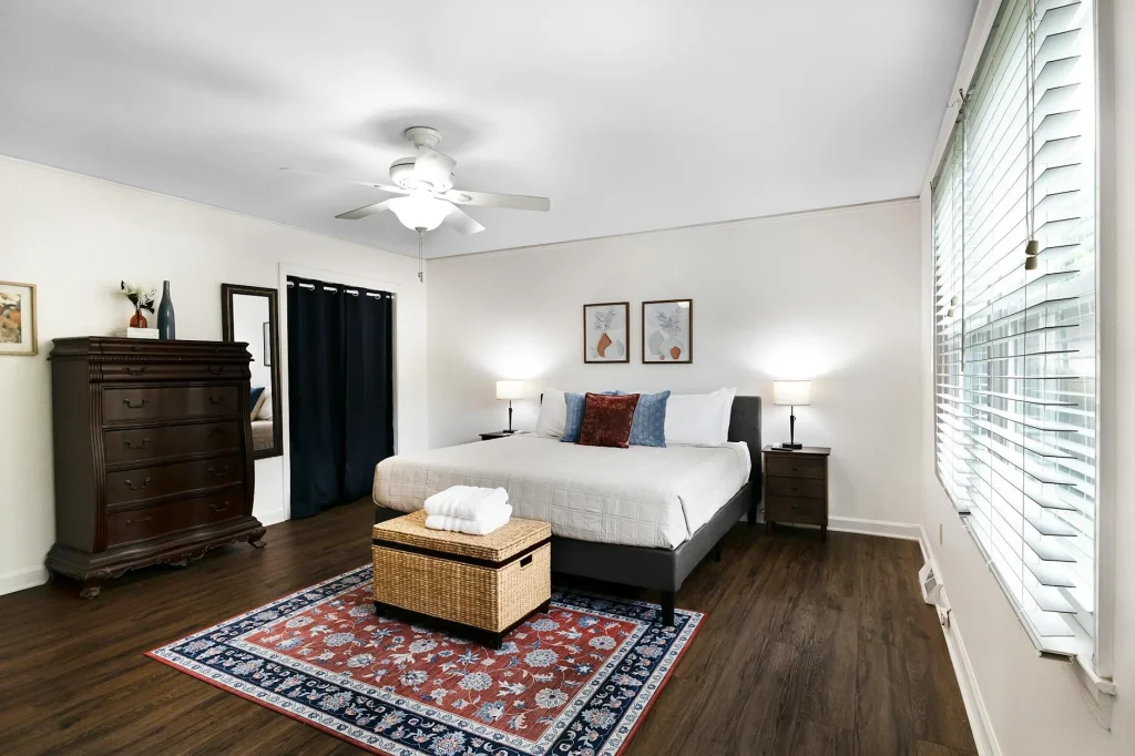 Modern bedroom with a king size mattress and clean white bedding