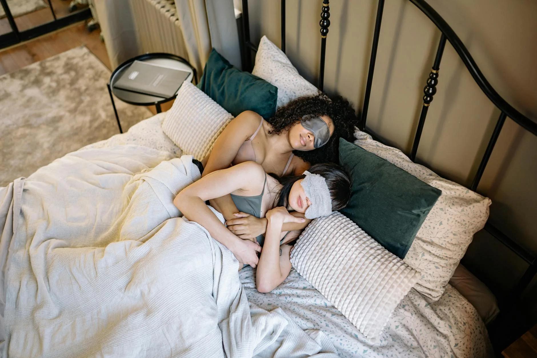 Couple sleeping comfortably on a quality mattress in a modern bedroom