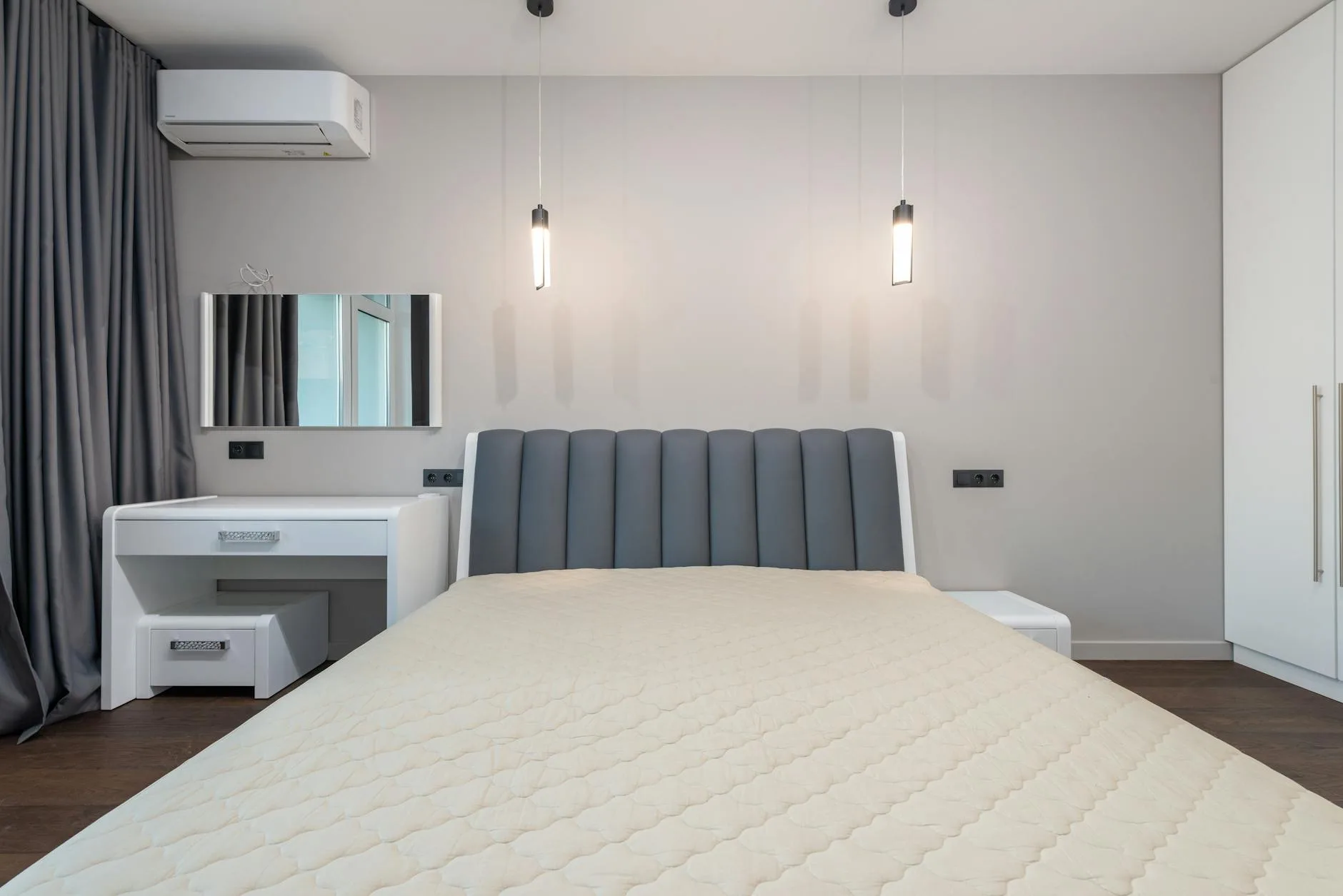 Well-maintained mattress in a clean bedroom showing proper care techniques