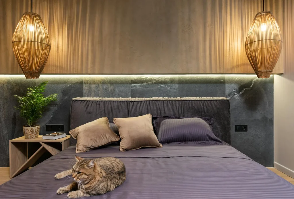Bedroom with warm ambient lighting from bedside lamps