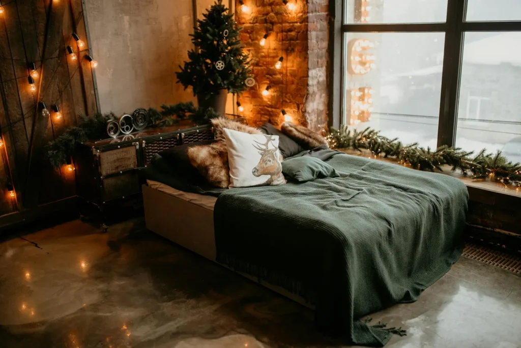 Cosy warm bed with soft blankets in a winter bedroom