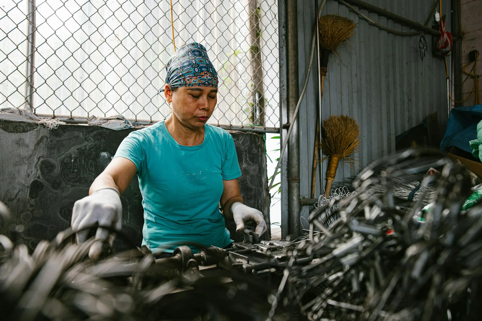 Mattress being processed at a recycling facility