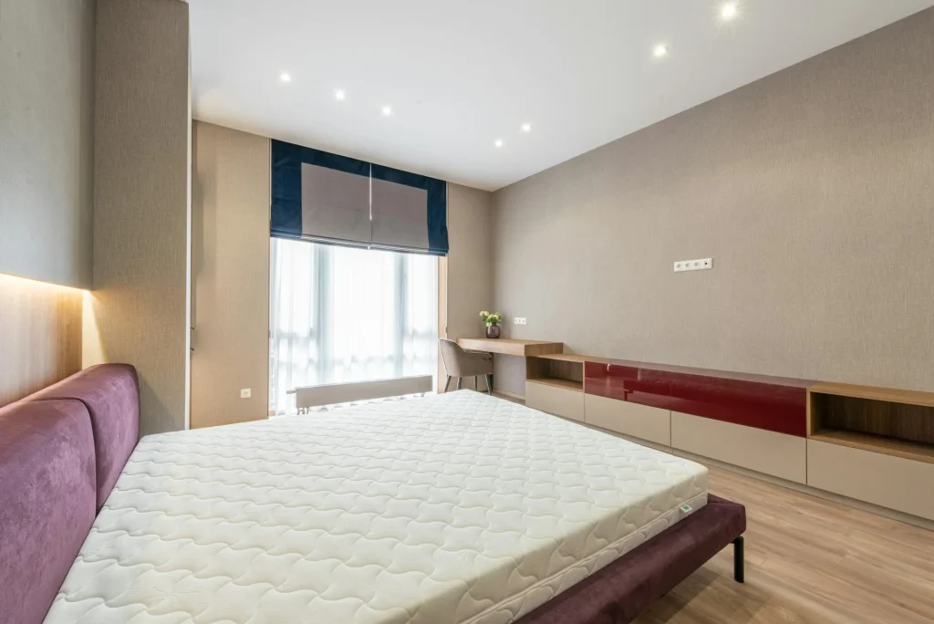 Old mattress in a bedroom ready for replacement