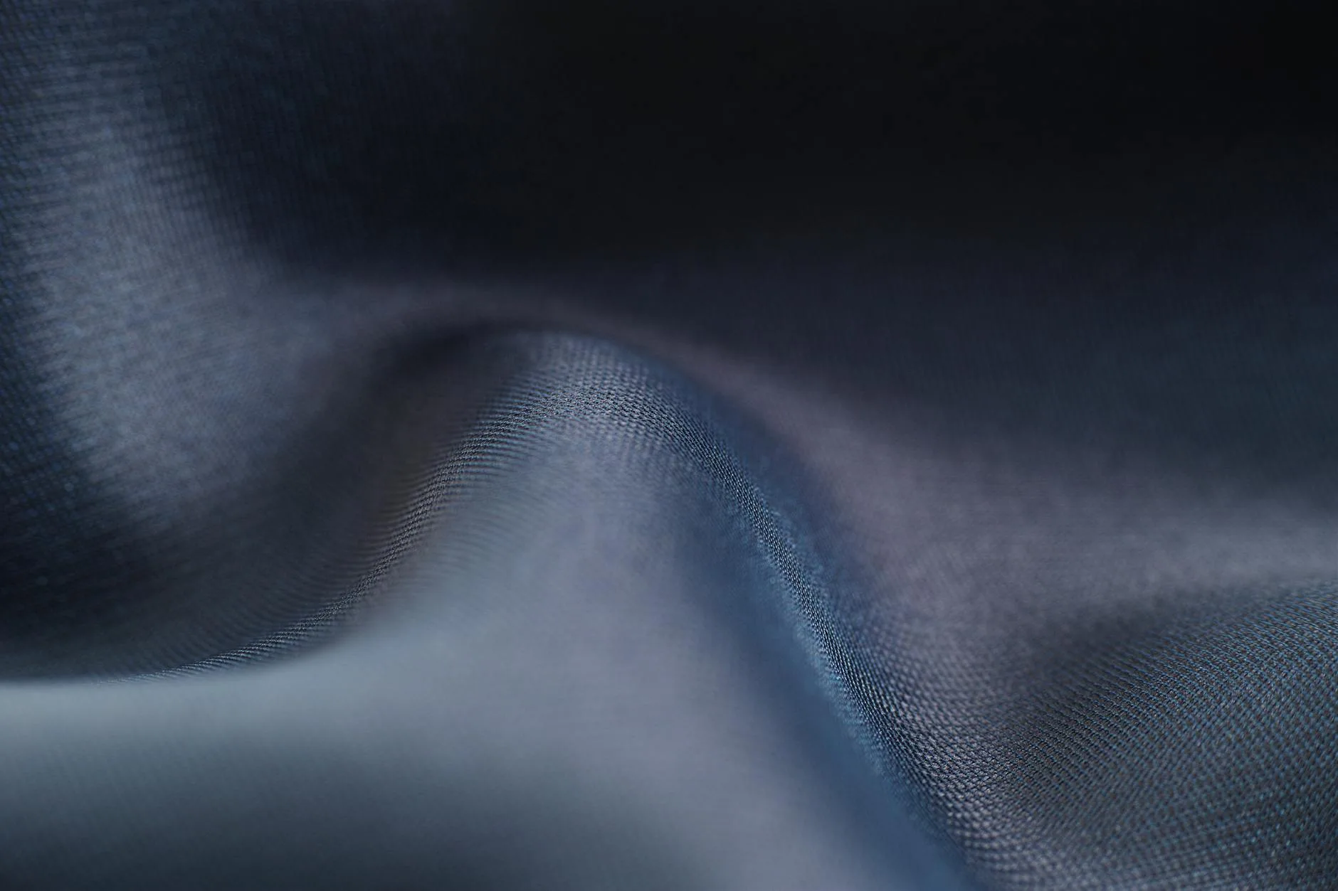 Close-up of smooth silk fabric showing natural sheen and texture