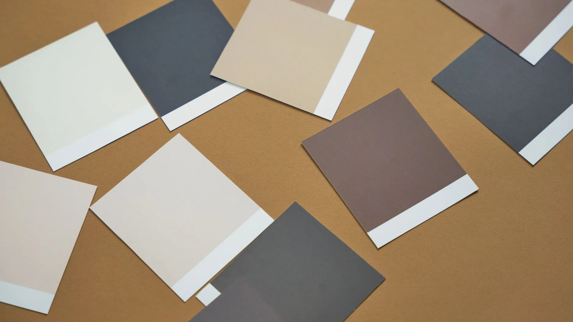 Paint swatches tested on a bedroom wall for 2026 colour trends UK