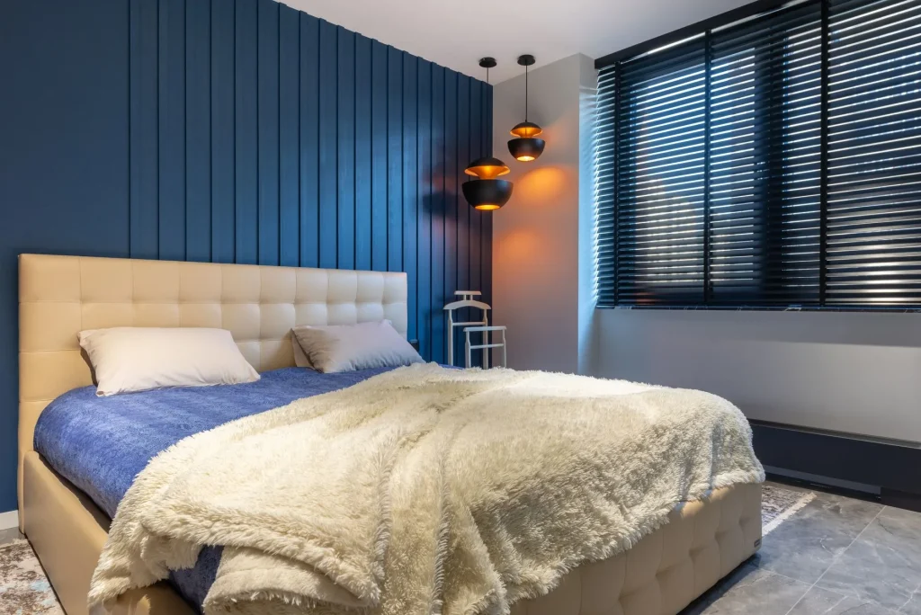 Blackout blind fitted to a bedroom window for better sleep