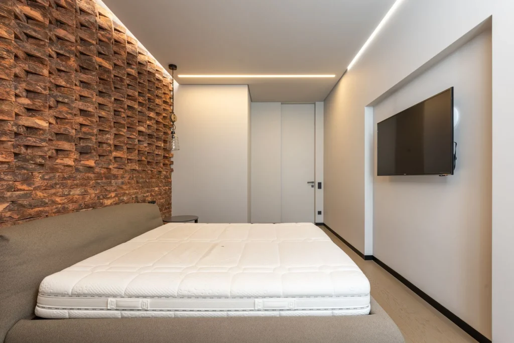 New mattress airing in a bedroom after unboxing